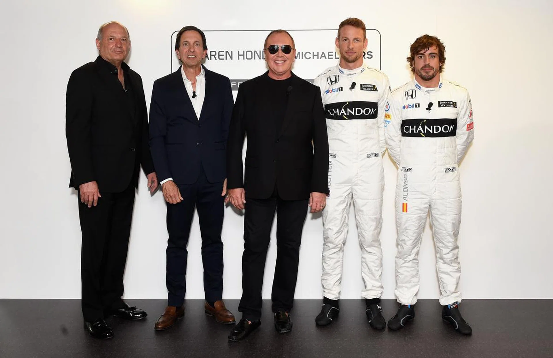 LONDON, ENGLAND - JUNE 22: (L-R) Ron Dennis, John Idol, Michael Kors, Jenson Button and Fernando Alonso attend Michael Kors and McLaren-Honda announcement on June 22, 2016 in London, England.  (Photo by David M. Benett/Dave Benett/Getty Images for Michael Kors)