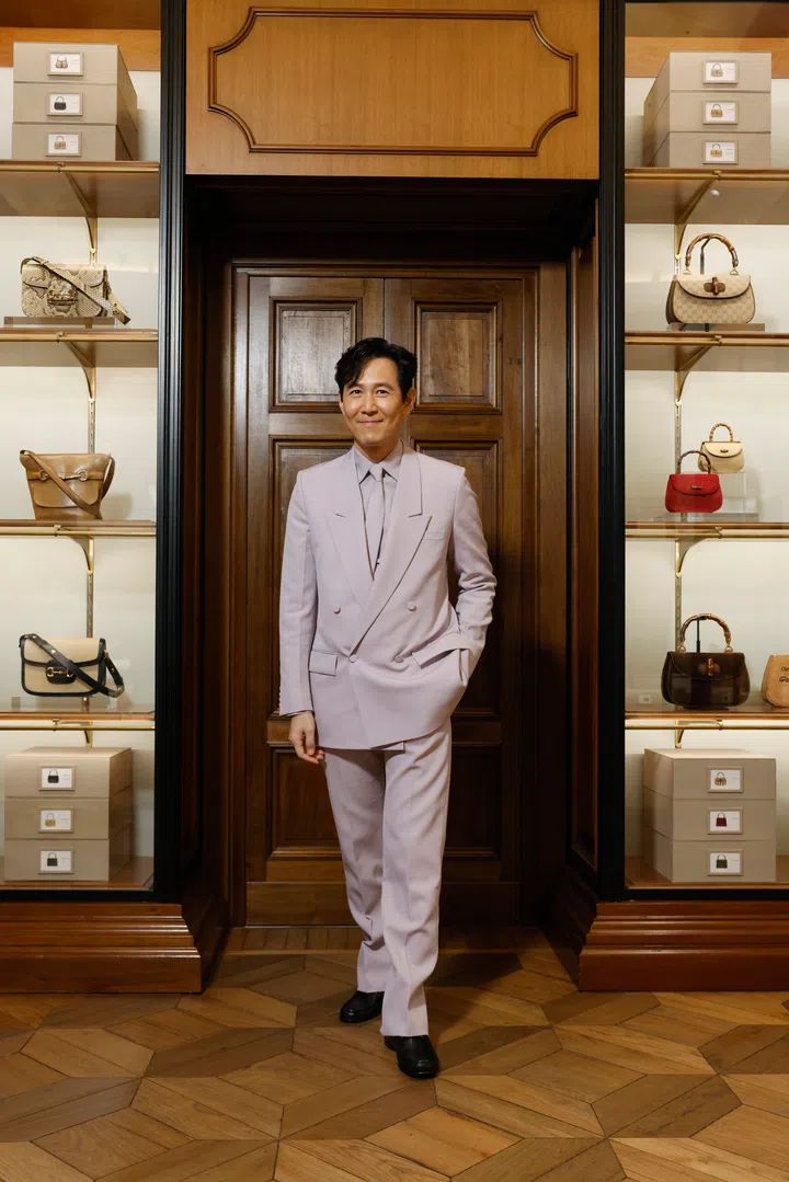 FLORENCE, ITALY - MAY 15: Lee Jung-jae attends the Gucci Cruise 2026 fashion show at Gucci Archive on May 15, 2025 in Florence, Italy. (Photo by Claudio Lavenia/Getty Images for Gucci)