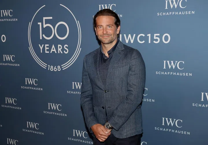 GENEVA, SWITZERLAND - JANUARY 16:  Bradley Cooper visits the IWC booth during the Maison's launch of its Jubilee Collection at the Salon International de la Haute Horlogerie (SIHH) on January 16, 2018 in Geneva, Switzerland. #IWC150  (Photo by Chris Jackson/Getty Images for IWC) *** Local Caption *** Bradley Cooper