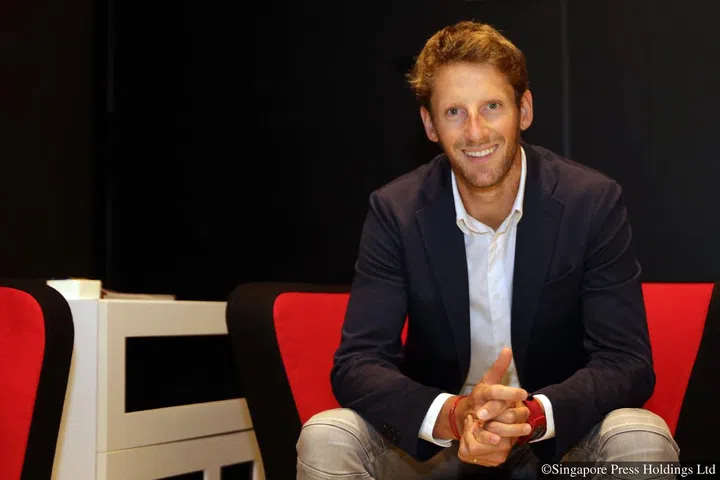 ST14092016-1625835702/ygfone15/Tiffany Goh/Yogaraj Panditurai///Photos of Romain Grosjean during the interview, and photos of him driving in the simulator.//Romain Grosjean interview. Why did he take the plunge with an American outfit after five years with Lotus? How big is F1 in America? How is the Liberty deal going to change the F1 landscape and can the sport displace Nascar?