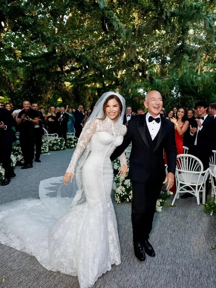 June 27, 2025, Venice, Italy: JUST MARRIED! Americans Emmy Award-winning journalist, author, and helicopter pilot LAUREN SANCHEZ, 55, and Billionaire businessman Amazon founder, the world's largest e-commerce and cloud computing company, JEFF BEZOS, 61, all smiles. Lauren glowing in a Dolce & Gabbana corseted lace wedding dress on her Friday nuptIals. “It’s been a wild ride, but it’s incredible,” Lauren Sánchez Bezos said. Jeffrey Preston Bezos wore a classic black tuxedo, which included a jacket, trousers, a black bow tie, a white button-down shirt, and a black vest. Ceremony, was on the island of San Giorgio Maggiore in Venice. (Credit Image: © Lauren Sanchez/Instagram via ZUMA Press Wire)