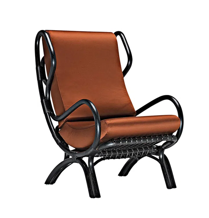 Molteni & C的Continuum扶手椅以精湛的 藤编工艺为亮点。Photo Courtesy of Molteni & C