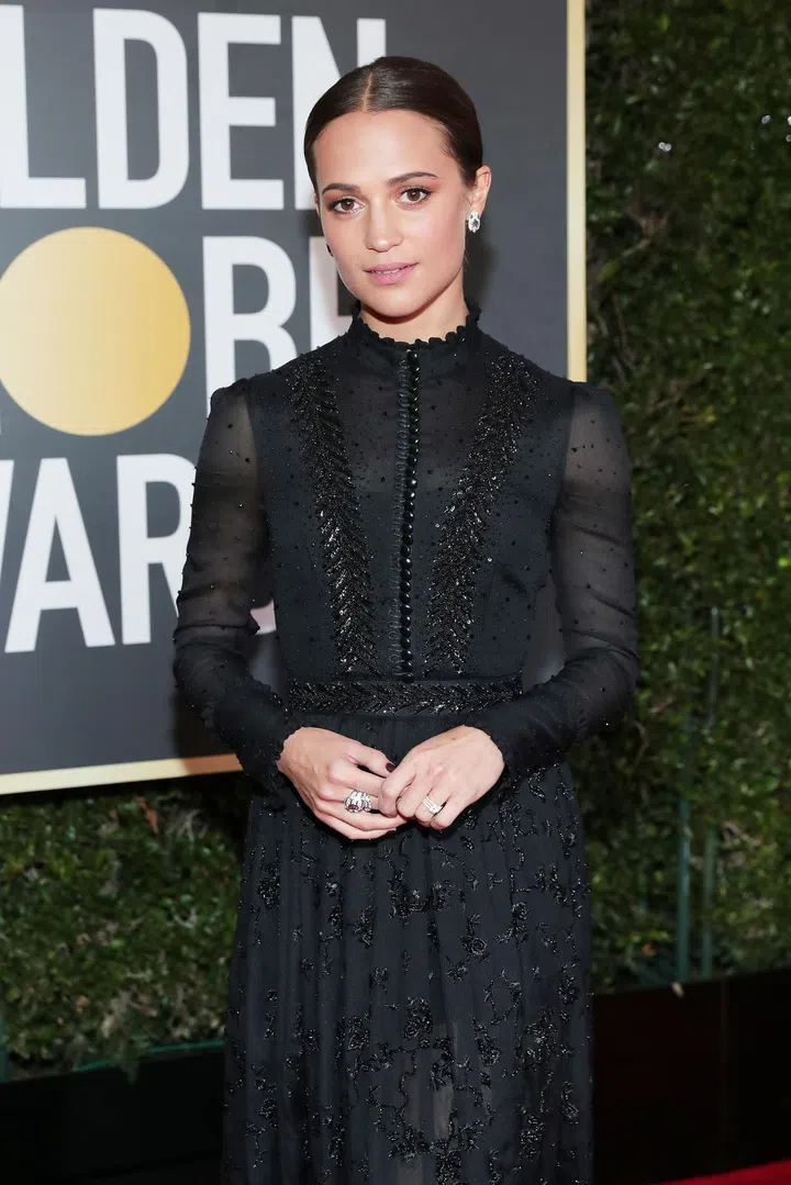 BEVERLY HILLS, CA - JANUARY 07:  75th ANNUAL GOLDEN GLOBE AWARDS -- Pictured: Actor Alicia Vikander arrives to the 75th Annual Golden Globe Awards held at the Beverly Hilton Hotel on January 7, 2018.  (Photo by Neilson Barnard/NBCUniversal/NBCU Photo Bank via Getty Images)