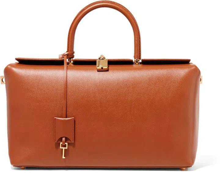 INDIALeather double top handle tote w leather flat flap closure.  Gold lock hardware and leather key fob
