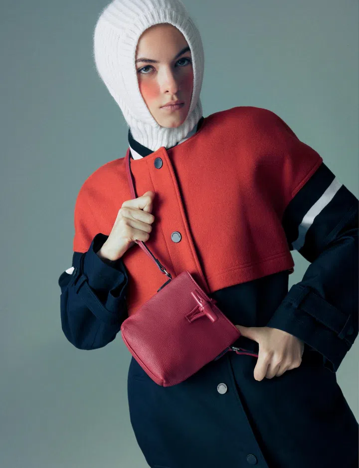 Longchamp coat $2,050, balaclava $360, Le Roseau bag $575