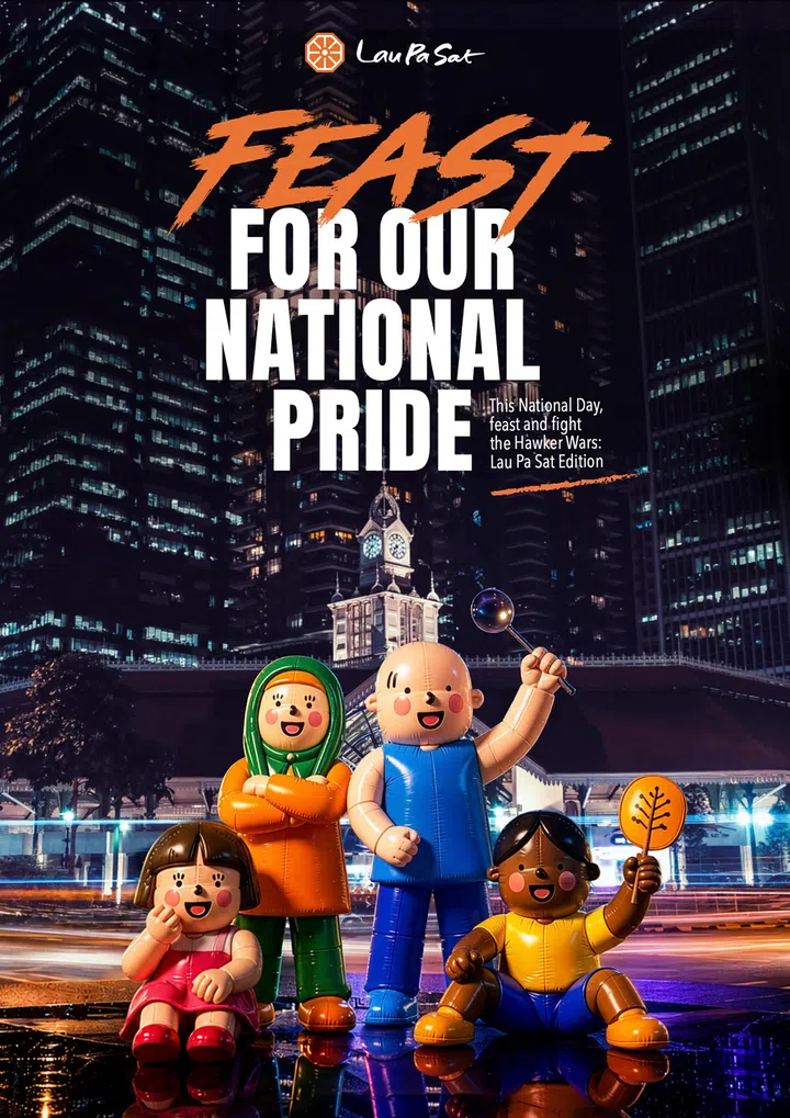 Lau Pa Sat国庆主题活动“Feast for Our National Pride”宣传海报，以夜晚的Lau Pa Sat钟楼及新加坡中央商务区摩天大楼为背景。海报中央以醒目的橙白色字体写上“Feast for Our National Pride”，并配上“This National Day, feast and fight the Hawker Wars: Lau Pa Sat Edition”字样。前景可见四个色彩鲜艳、造型可爱的《Hawker Wars》角色公仔，分别手持汤匙和树叶等道具，站在Lau Pa Sat前方，营造充满趣味与节庆气氛的国庆主题活动视觉。