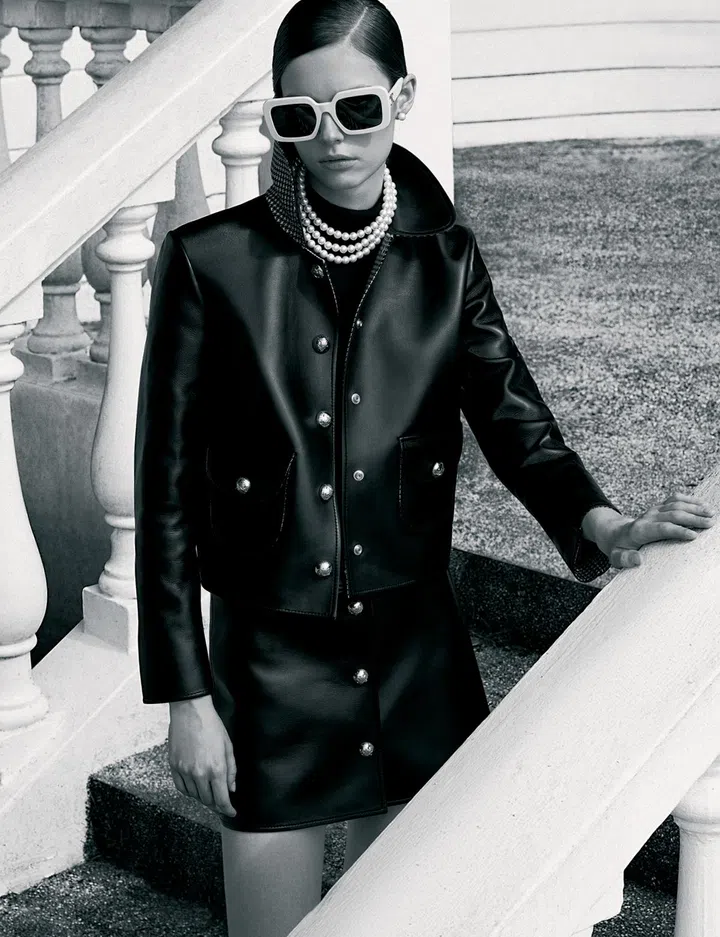CELINE BY HEDI SLIMANE top $2,250, jacket $7,900, skirt $4,450, sunglasses $820, earrings $690, necklace $1,550