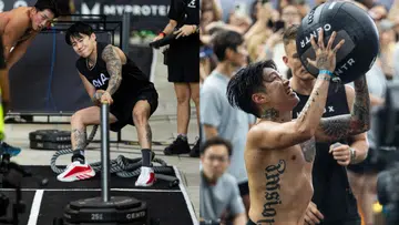 Jay Park在HYROX比赛中进行高强度训练动作，一边用力推动sled，一边完成wall ball投掷，肌肉紧绷、神情专注，现场观众围观拍摄，比赛气氛紧张而热烈。