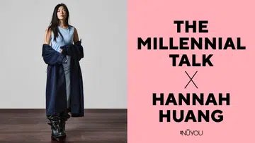 Hannah Huang 穿着浅蓝无袖上衣、深蓝长外套与长靴，站在浅灰背景前，整体风格简洁又有力量。右侧以粉色背景呈现“The Millennial Talk × Hannah Huang”的标题。
