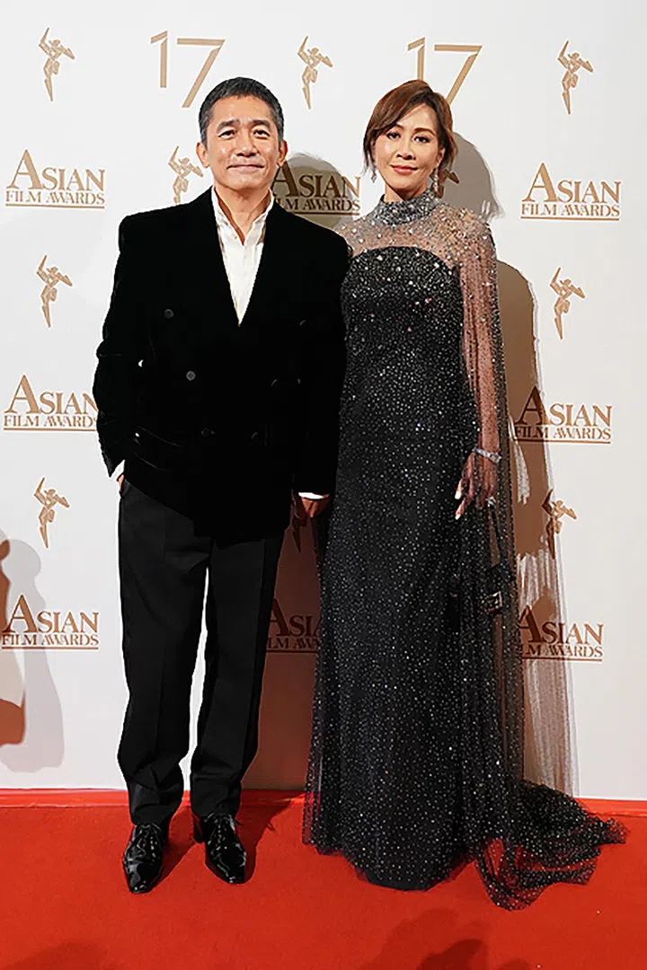 HONG KONG, CHINA - MARCH 10: Tony Leung Chiu Wai, left, and Carina Lau attend the 17th Asian Film Awards on March 10, 2024 in Hong Kong, China. (Photo by Anthony Kwan/Getty Images)