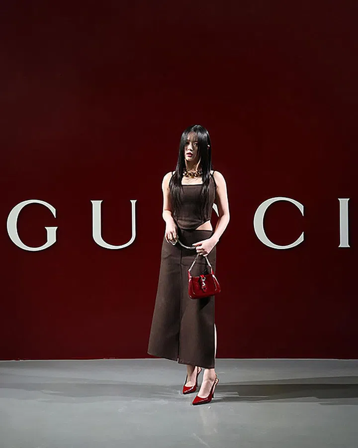 MILAN, ITALY - FEBRUARY 23: Hanni attends the Gucci Women's Fall Winter 2024 Fashion Show during Milan Fashion Week Womenswear Fall/Winter 2024-2025 at Fonderia Carlo Macchi on February 23, 2024 in Milan, Italy. (Photo by Vittorio Zunino Celotto/Getty Images for Gucci)