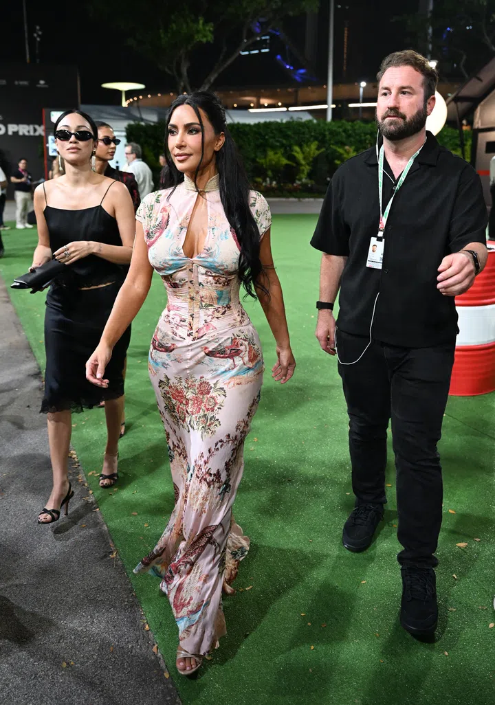 SINGAPORE, SINGAPORE - OCTOBER 11: Kim Kardashian looks on in the Paddock during the F1 Grand Prix of Singapore at Marina Bay Street Circuit on October 11, 2026 in Singapore, Singapore. (Photo by Mark Sutton - Formula 1/Formula 1 via Getty Images)