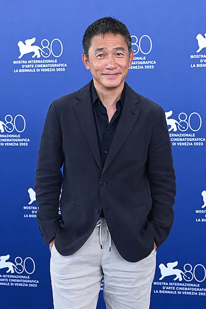 VENICE, ITALY - SEPTEMBER 02: Tony Leung Chiu-Wai  attends a photocall for the Golden Lion For Lifetime Achievement & "The Lion's Share: A History Of The Mostra" at the 80th Venice International Film Festival on September 02, 2023 in Venice, Italy. (Photo by Stephane Cardinale - Corbis/Corbis via Getty Images)