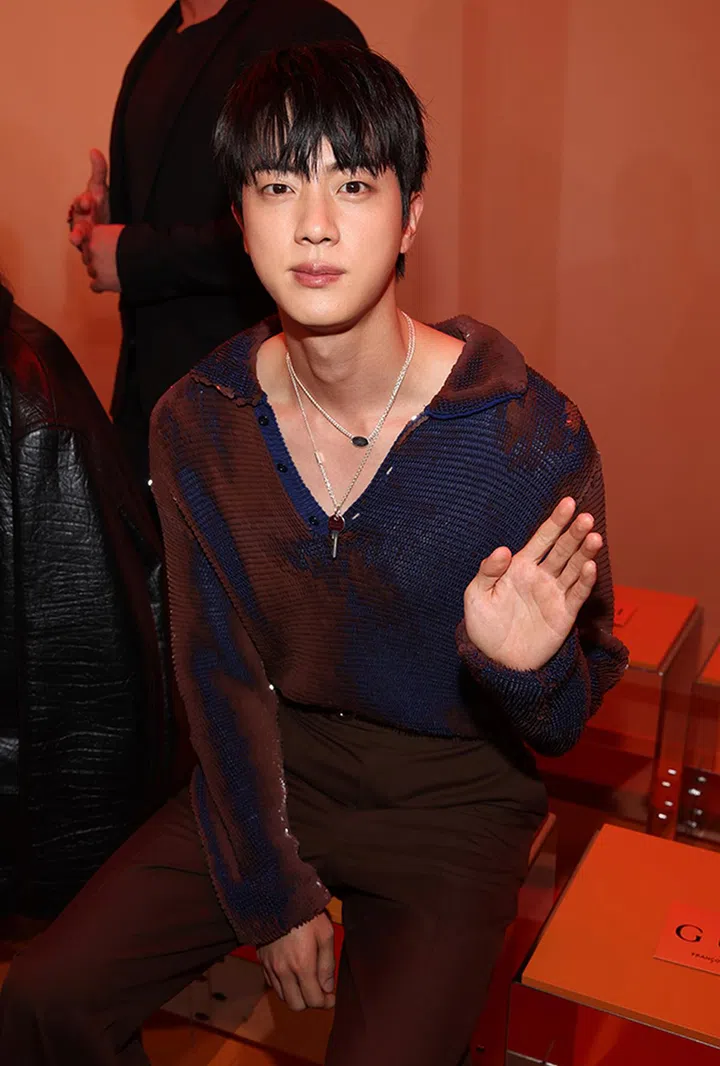 MILAN, ITALY - SEPTEMBER 20: Jin is seen front row at the Gucci  Women's Spring Summer 2025 Fashion Show during the Milan Fashion Week Womenswear Spring/Summer 2025 at Triennale di Milano on September 20, 2024 in Milan, Italy. (Photo by Daniele Venturelli/Getty Images for Gucci)
