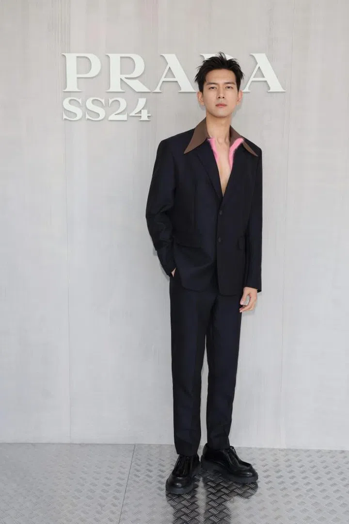 MILAN, ITALY - JUNE 18: Li Xian attends the Prada Spring/Summer 2024 Menswear Fashion Show during the Milan Men's Fashion Week F/W 2023 - 2024 at Fondazione Prada on June 18, 2023 in Milan, Italy. (Photo by Vittorio Zunino Celotto/Getty Images for Prada)