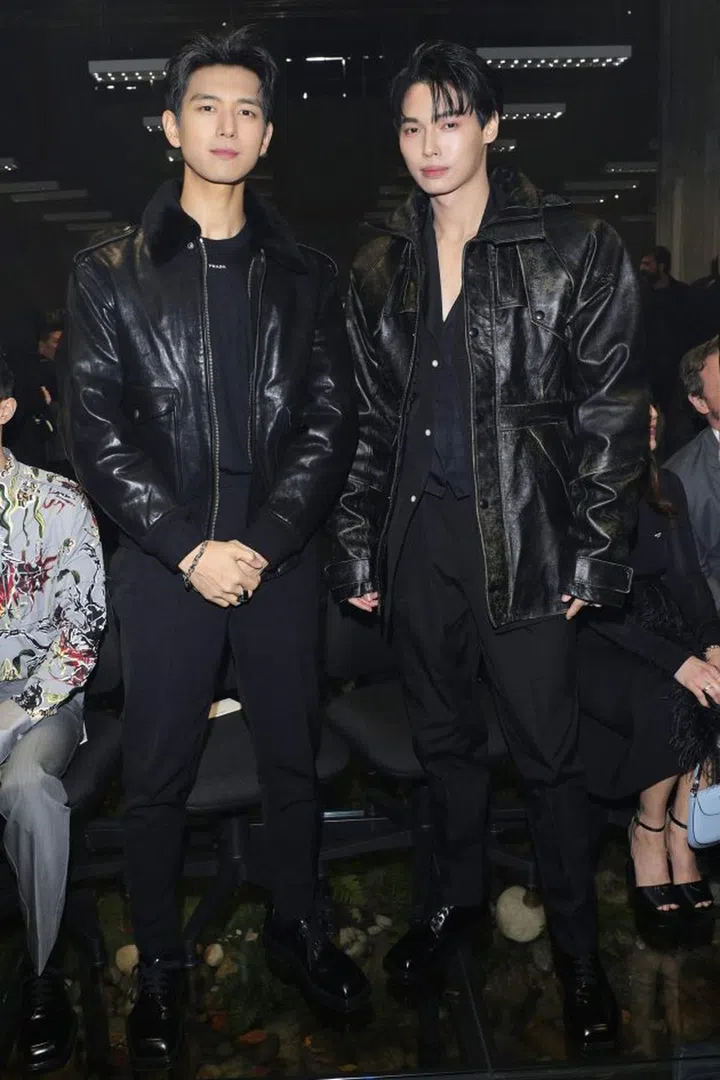 MILAN, ITALY - JANUARY 14: (EDITORS NOTE: This image has been retouched at the request of the subject.) Li Xian and Metawin Opas-iamkajorn attend the Prada Fall/Winter 2024 Menswear Fashion Show on January 14, 2024 in Milan, Italy. (Photo by Jacopo M. Raule/Getty Images for Prada)