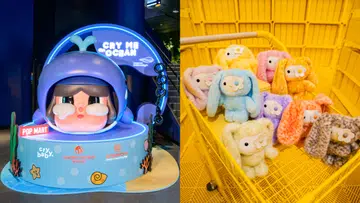 左右拼接的宣传图片。左侧展示“CRY ME an OCEAN”主题装置，一个巨型蓝色CRYBABY角色戴着鲸鱼造型头套，双眼含泪，置于圆形海洋主题底座上，背景有发光的“CRY ME an OCEAN”标志，以及POP MART、Resorts World Sentosa和Singapore Oceanarium标识，整体以蓝色灯光营造海底氛围。右侧展示多款毛绒CRYBABY玩偶，分别以粉色、黄色、蓝色、紫色、橙色、灰色等不同颜色呈现，坐放在一辆黄色购物车内，每只玩偶都戴着白色小花装饰，背景同样为亮黄色空间，整体风格可爱疗愈，突显活动限定周边商品。
