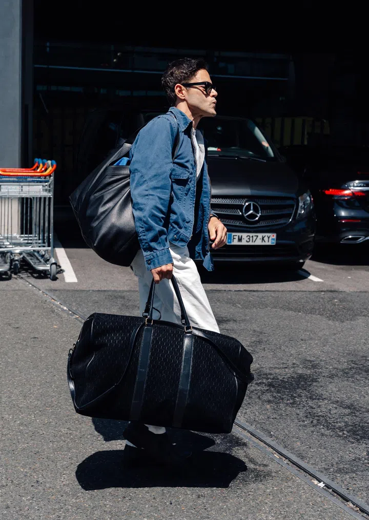 BGUK_3618374 - *EXCLUSIVE* Paris, FRANCE  The American Actor Rami Malek arriving into Charles de Gaulle Airport in Paris, France.    Pictured: Rami Malek    BACKGRID UK 22 JUNE 2026     UK: +44 208 344 2007 / uksales@backgrid.com    USA: +1 310 798 9111 / usasales@backgrid.com    *Pictures Containing Children Please Pixelate Face Prior To Publication*
