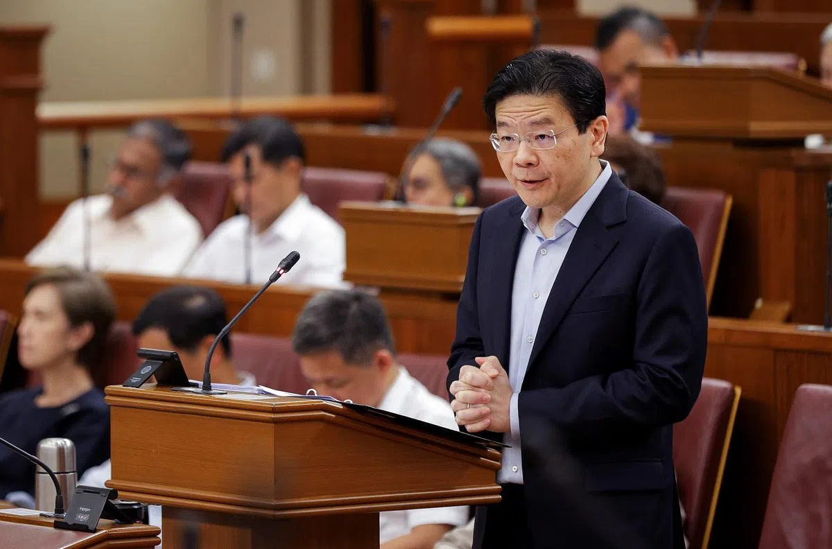 新加坡总理兼财政部长黄循财以感冒后鼻音很重的嗓音，2月18日下午在国会宣读财政预算案声明。（数码发展及新闻部）