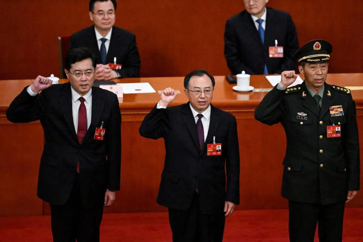 秦刚（左）和李尚福（右）分别在今年3月受委任为外长及防长。（法新社）