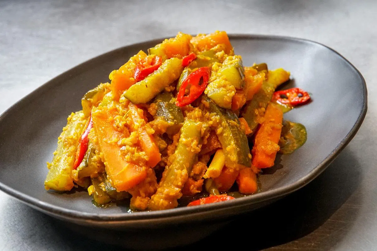 马来阿渣。（tanamerah.com）