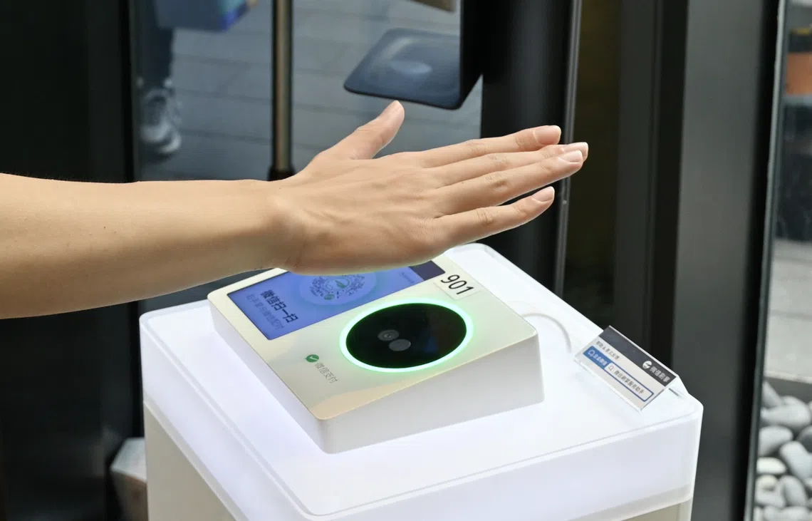 中国互联网巨擘腾讯宣布有意将刷掌支付推广至全球。（腾讯）