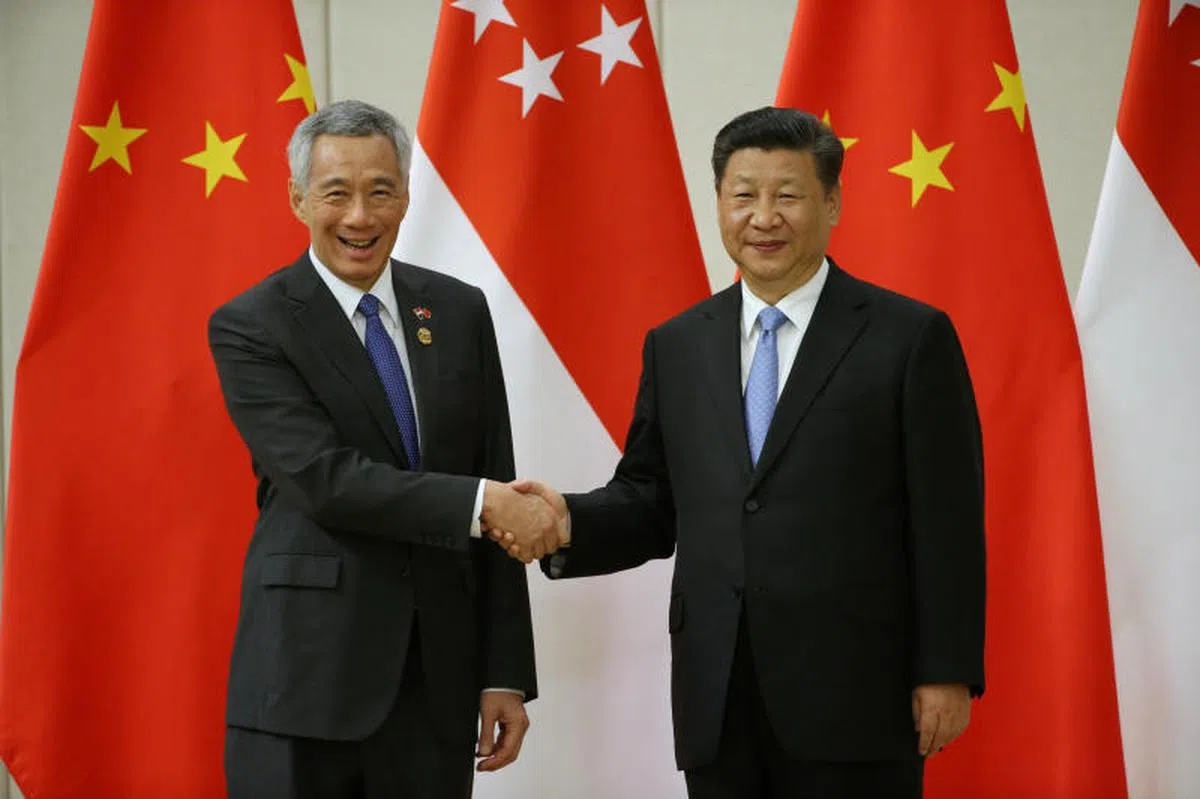  李显龙总理（左）在短短六个月内，两次与中国国家主席习近平会面。（联合早报） 