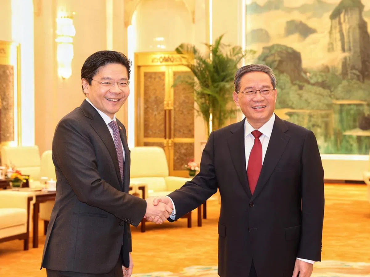 黄循财和李强时隔五年在北京会面。（黄循财脸书）