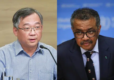 谭德塞（右）和颜金勇会面后赞许新加坡的防疫工作“令人印象深刻”。（李国豪制图）