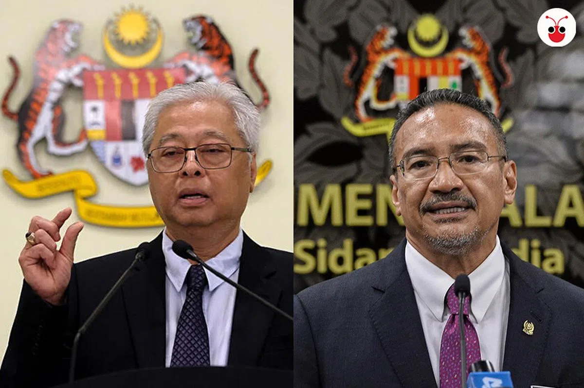  马来西亚新科副首相兼国防部长依斯迈沙比里（左）与外交部高级部长希山慕丁。（红蚂蚁制图） 