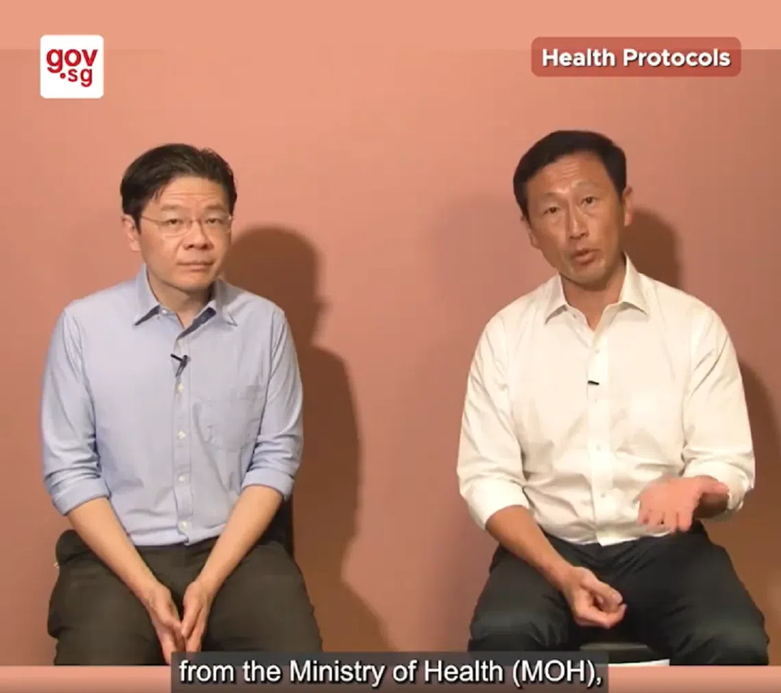 王乙康和黄循财录制视频，解答冠病常见问题。（取自gov.sg视频）