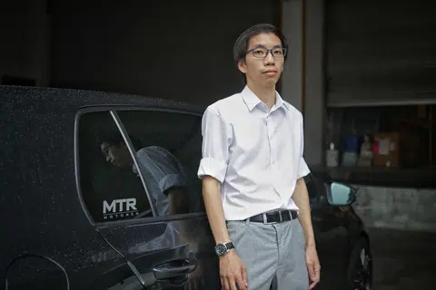 “英雄司机”甄思良。(海峡时报）