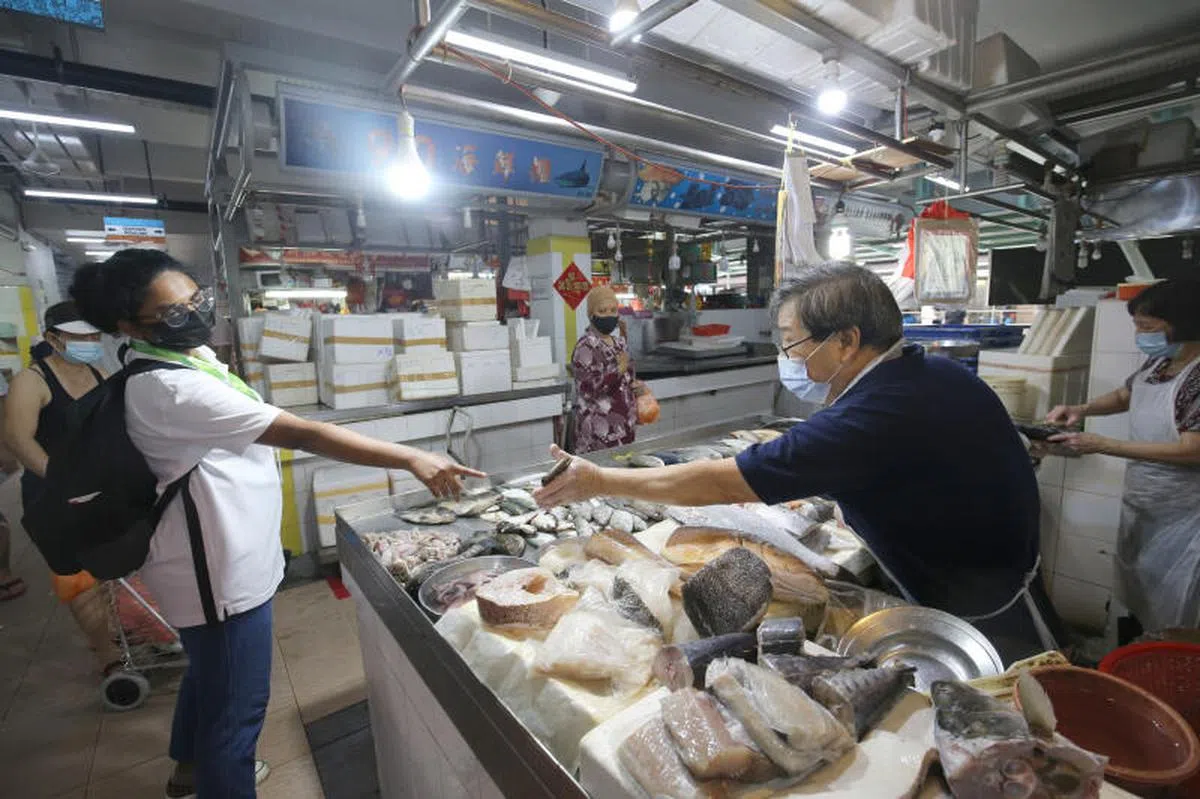 大巴窑大牌127巴刹的鱼档。（联合晚报)