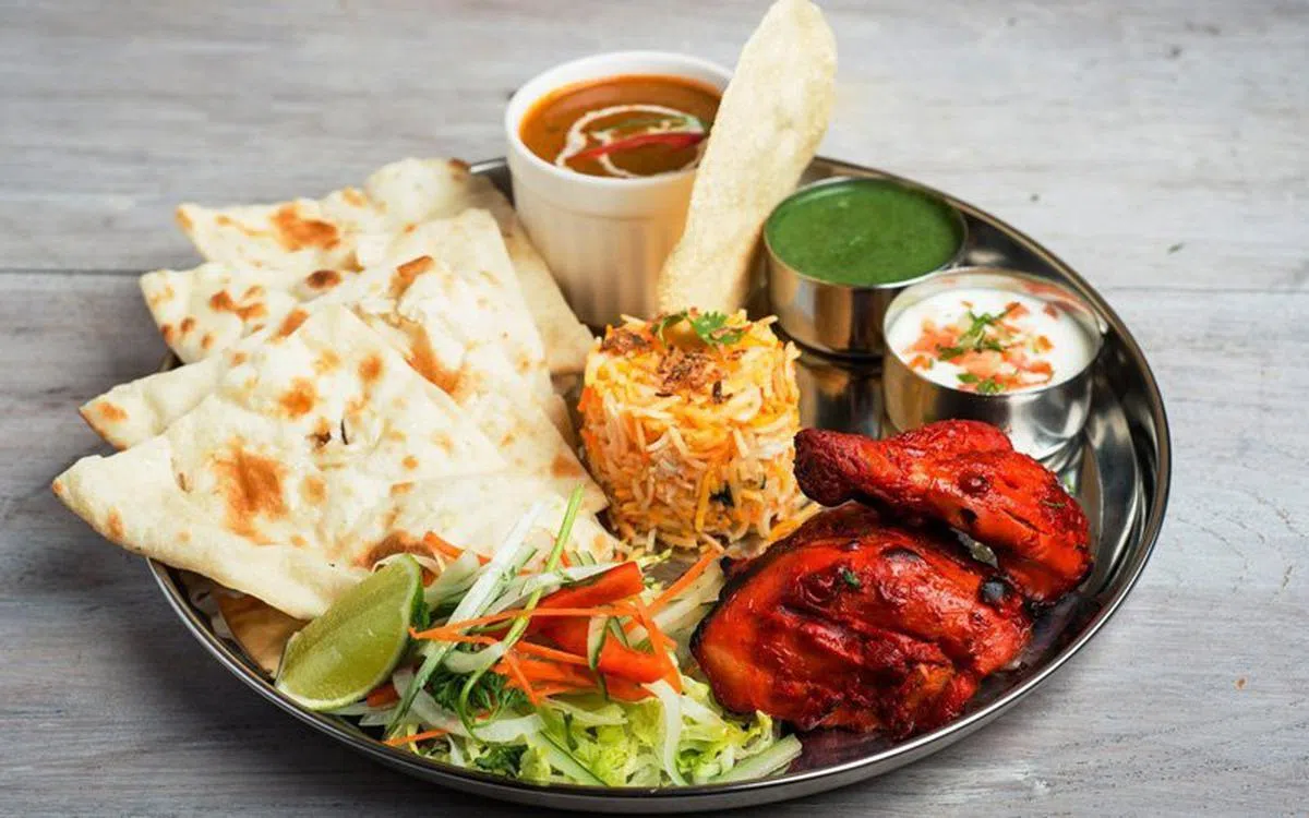  招牌菜：炭烤鸡肉+馕 Tandoori Naan（14元9角） 