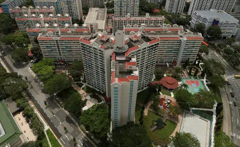 图中Y字形的大巴窑5巷第53座组屋，自1966年建成后迎来了许多外国贵宾。（海峡时报）
