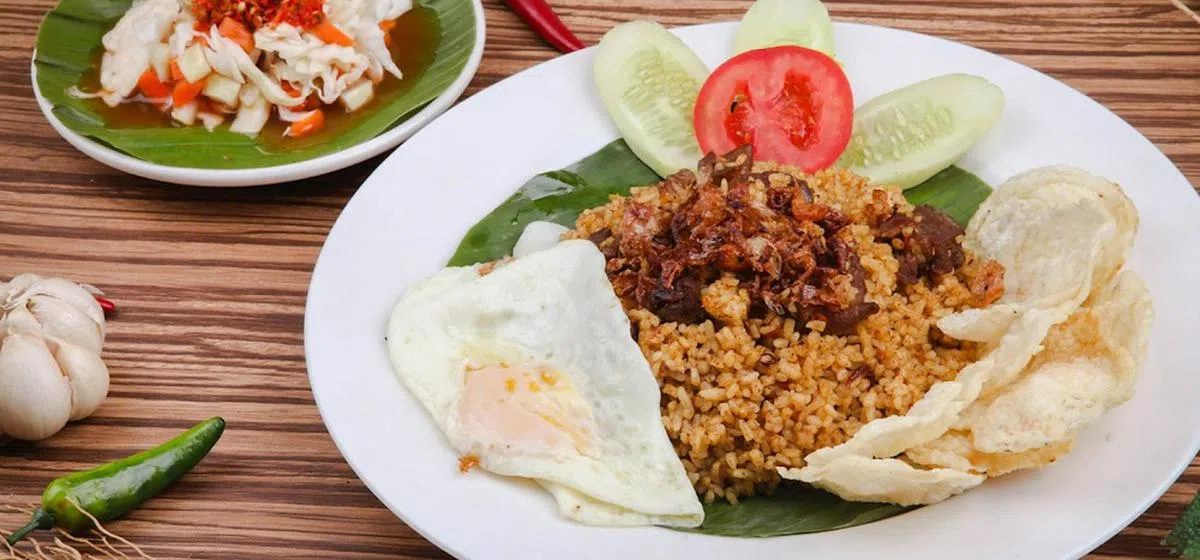 马来西亚的羊肉炒饭。（TasteAtlas网站截图）