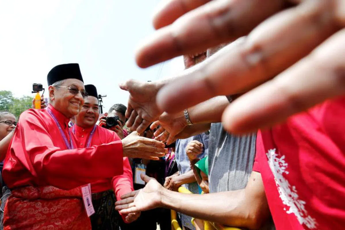  马哈迪接见选民。（路透社） 