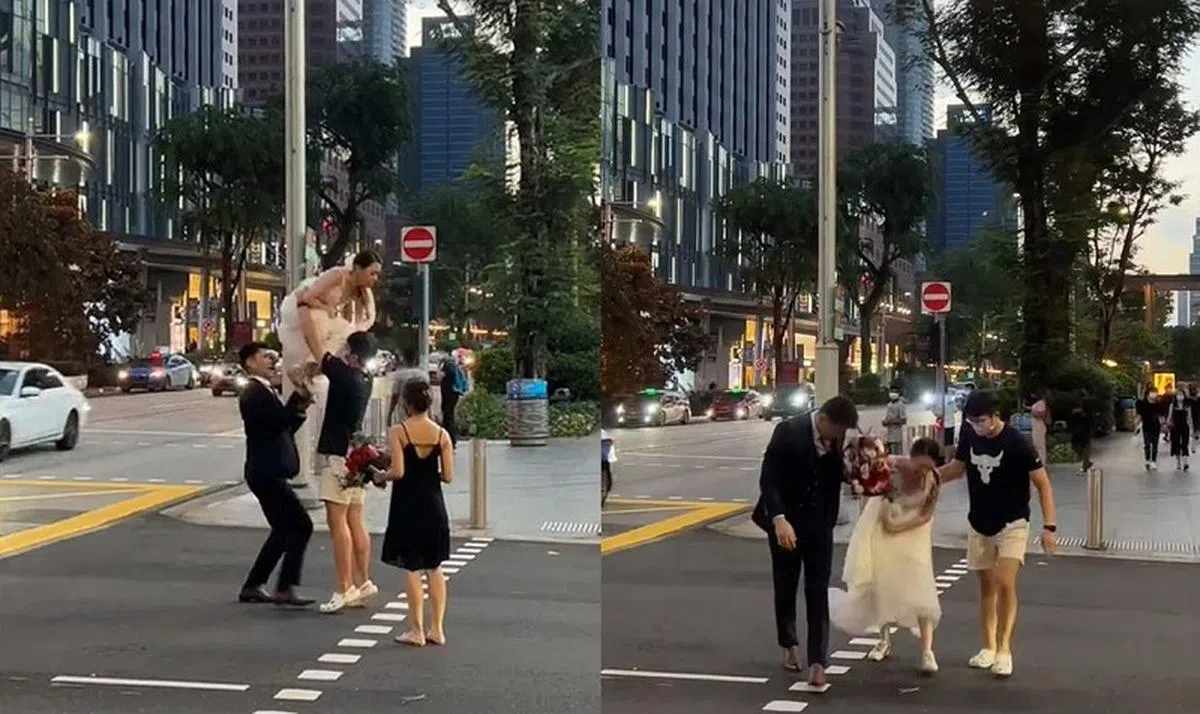 在乌节路马路中央取景，分秒必争的情形让人看得胆战心惊。（Tiktok截图／红蚂蚁制图）