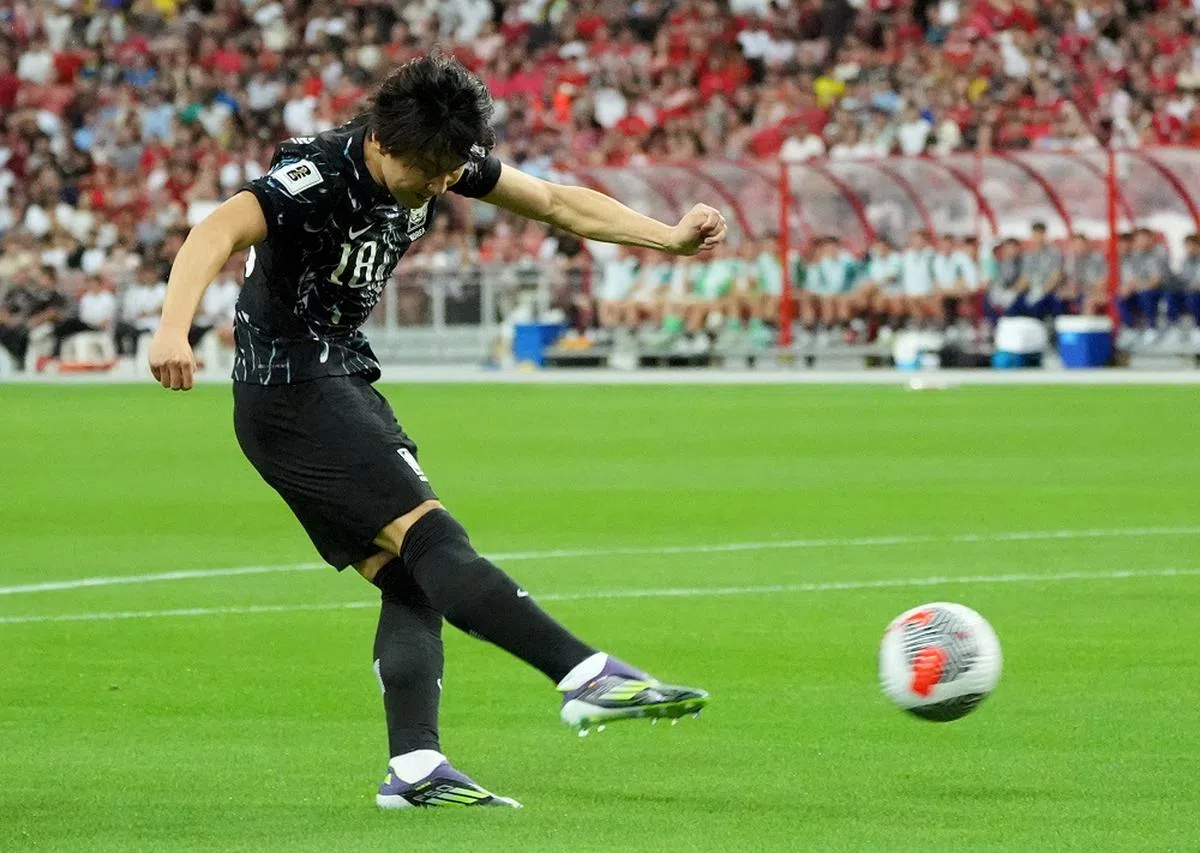 李刚仁在上半场第9分钟，为韩国队首开纪录。（路透社）