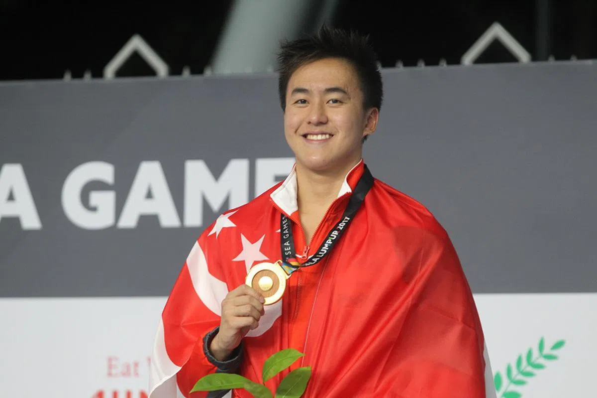  柯正文在第29届马来西亚东南亚运动会（东运会）男子200米蝶泳比赛中，一马当先以1分57秒95为新加坡获得一枚金牌。（联合早报） 