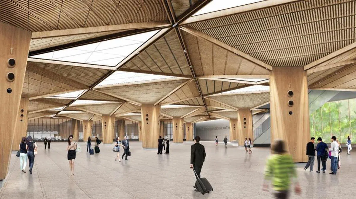 新柔地铁兀兰北站共三层楼，其中两层设于地下。乘客从地面入口处进站，在地下楼层办理通关手续便可直达新柔地铁乘车月台，过程快捷方便。图为新柔地铁兀兰北站入口处的构想图。（陆交局提供）