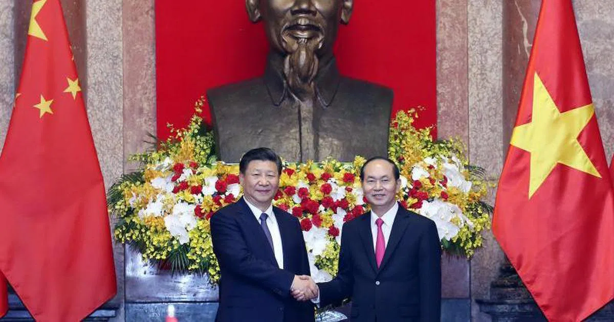  中共总书记习近平在河内主席府与越南国家主席陈大光举行会谈。（路透社） 