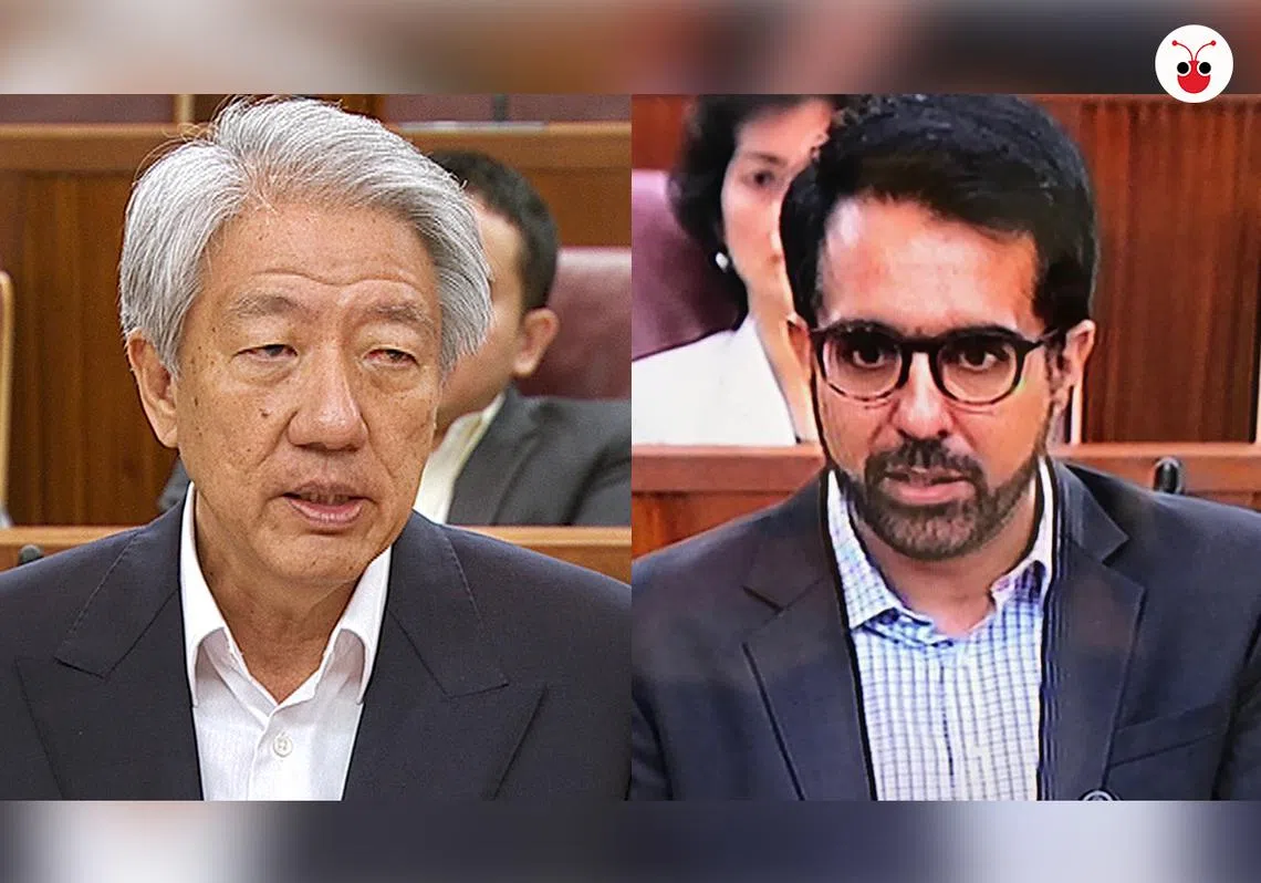 副总理张志贤（左）和工人党秘书长今天在国会上就部长薪金问题交锋。（曾庆祥制图）