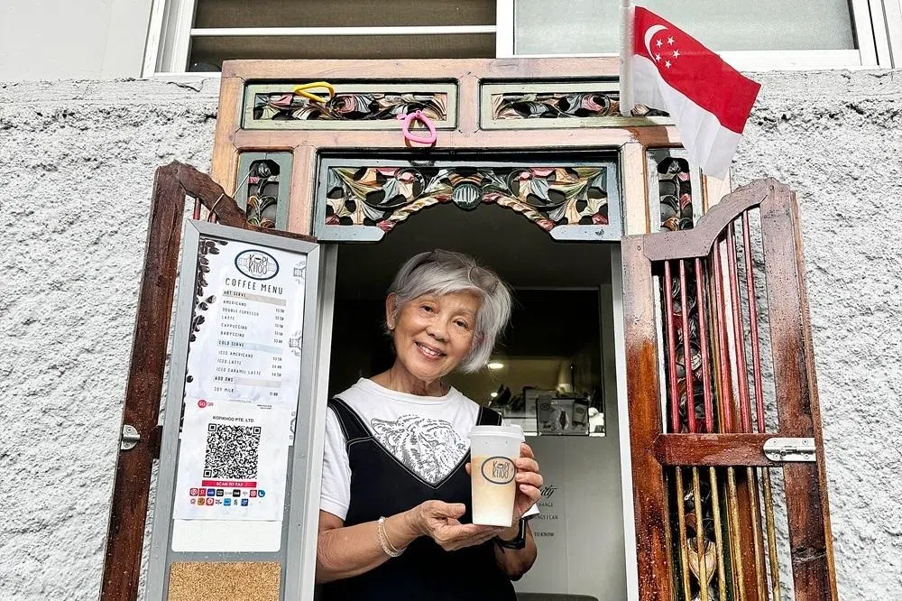 黄宝莲不仅用咖啡，也用笑容温暖了客人的心。