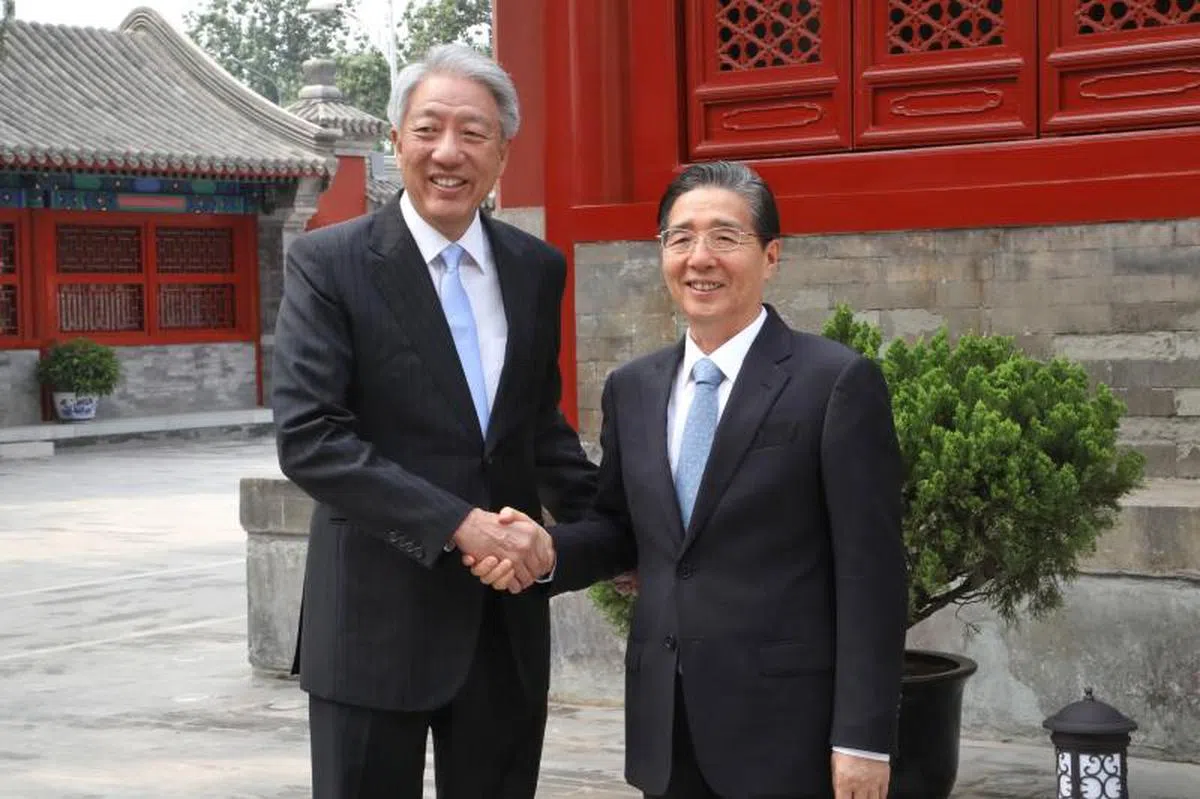  张志贤（左）7月2日在北京会见中共中央政法委书记郭声琨。（通讯及新闻部提供） 