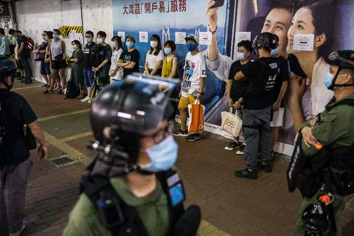  港版《国安法》在香港实施后，外界担忧香港的言论自由将从此消失，引发寒蝉效应。（法新社） 