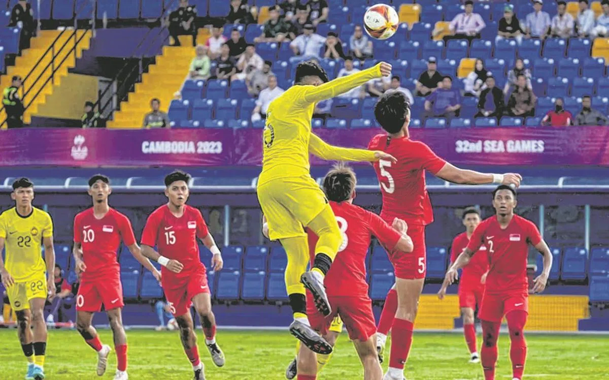 幼狮队在2023年东运会最后一轮小组赛0比7惨败在马来西亚脚下，最终小组垫底无缘出线。（新加坡足总提供）