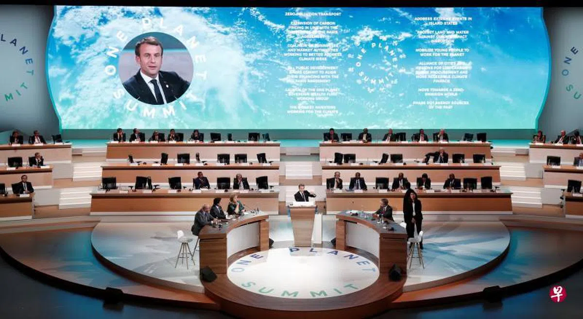  法国总统马克龙在气候峰会上呼吁国际社会加速行动，让全球暖化斗争迈入一个新阶段。（路透社） 