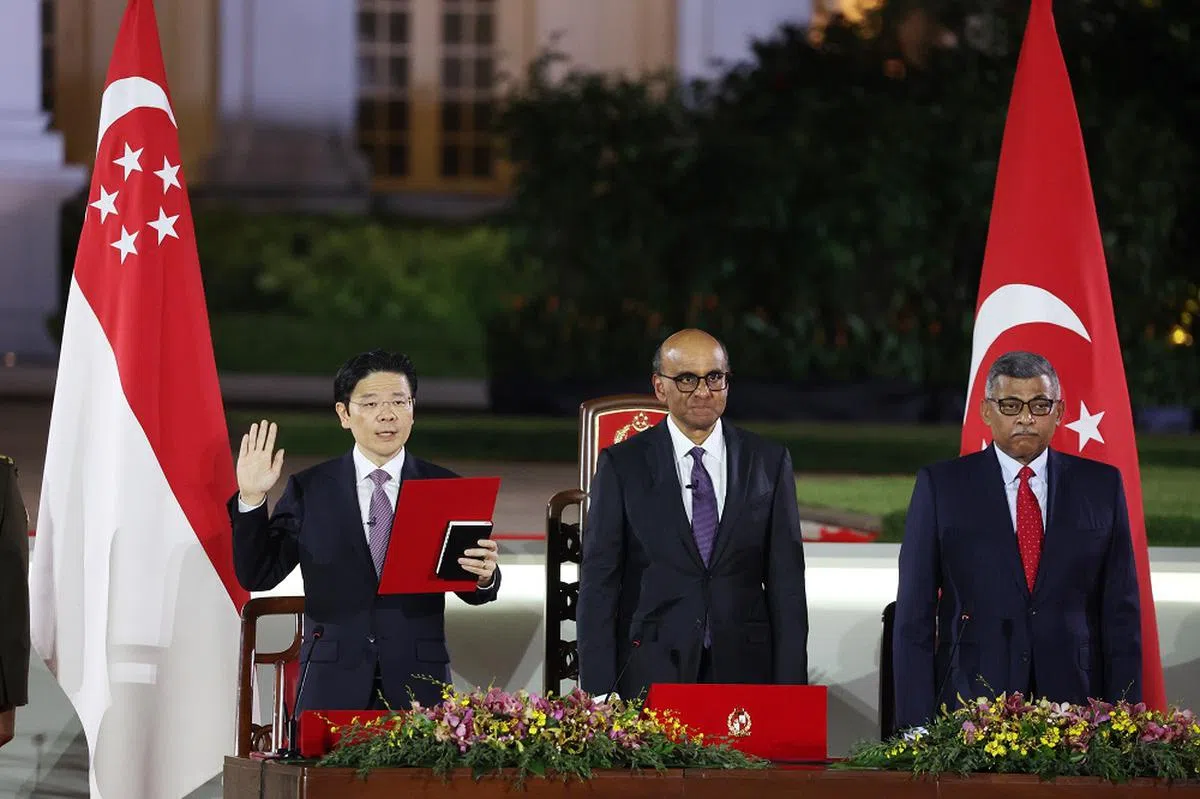 内政部说，与郭文贵相关的社媒账号经过协调的帖子，发布时间恰逢新加坡政治领导层交棒，表明这是有蓄谋的策划和行动。图为黄循财总理于5月15日宣誓就职。（联合早报）