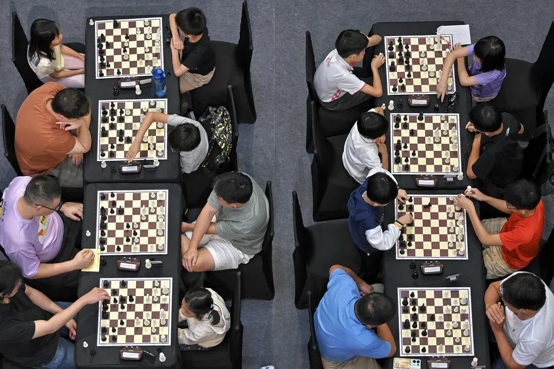 棋逢敌手。（海峡时报）